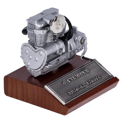 Featuring cast pewter construction on a wooden base.
Measurements: Length= 3'' Height= 4'' Width= 3''
