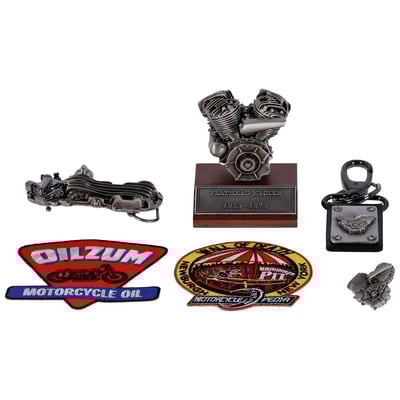 Includes a motor model, keychain, lapel pin, belt buckles and patches that can be ironed or sewn on. For 45 solo Side Valve models.
Flathead model with base height= 3-3/8''