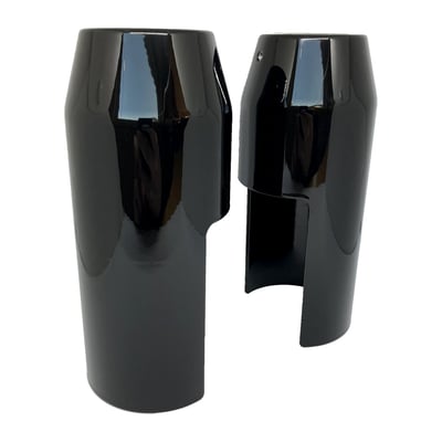 Manufactured from CNC machined billet aluminum. Gloss black painted with a clear coat finish. Ready to provide a blackout look and give a massive muscle bike stance. Fits the stock 49mm fork tubes, outside diameter of the cover is is 55mm which will accept a wide range of fairing clamps.  
Note: Matching upper fork covers are sold separately. 
Note: See 993568 (Softail) and 993567 (Dyna) for the matching upper fork cover set and 993570 for the matching fork tube cap set. 