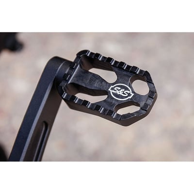 This mid-control brake pedal provides the extra clearance required when installing S&S performance exhaust systems and slip-on mufflers. Offers improved braking feel and control. Designed for use on all M8 Softail models with mid controls and compatible with OEM foot controls. Will also fit M8 Softail models with forward control when converted to mid-controls, when using the OEM Fat Bob exhaust header. The brake pedal is precision CAD designed, CNC machined from 6061-T6 Billet aluminum and stress tested. Black anodized for lasting good looks.