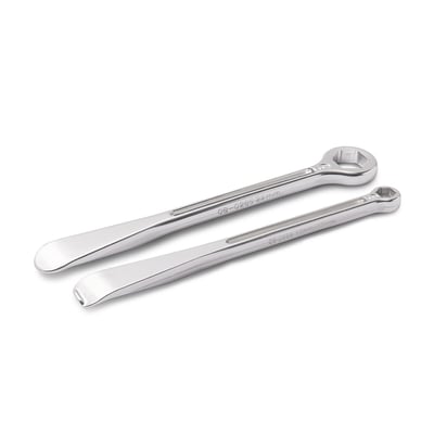 - Tire spoon with axle nut hex wrench and tire spoon hex wrench for rim lock nut set 
- Both levers have perfectly contoured tire lever on one end 
- One lever has unique combination stepped 10/12 mm box end wrench on other end for turning 
rim lock nuts 
- Unique no-pinch tip on one lever helps protect inner tube during tire installation 
- Second wrench has hex box wrench for 22 mm axle nuts on other end 
- Made from lightweight forged 7075-T6 aluminum 
- Hard anodized finish 
- Under 10 inches in length and weigh only 3.5 oz. 
- Hex ends for axle nuts are rated for a maximum torque of 90 lb/ft
