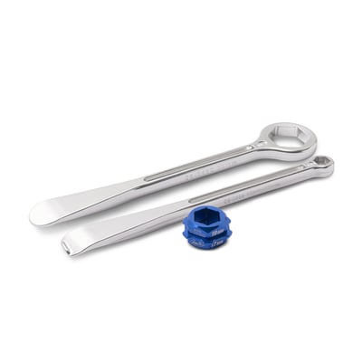 - Tire spoon with axle nut hex wrench and tire spoon hex wrench for rim lock nut set 
- Both levers have perfectly contoured tire lever on one end 
- One lever has unique combination stepped 10/12 mm box end wrench on other end for turning 
 rim lock nuts 
- Unique no-pinch tip on one lever helps protect inner tube during tire installation 
- Second wrench has hex box wrench for 30 mm axle nuts on other end 
- Made from lightweight forged 7075-T6 aluminum 
- Hard anodized finish 
- Under 10 inches in length and weigh only 3.5 oz. 
- Hex ends for axle nuts are rated for a maximum torque of 90 lb/ft